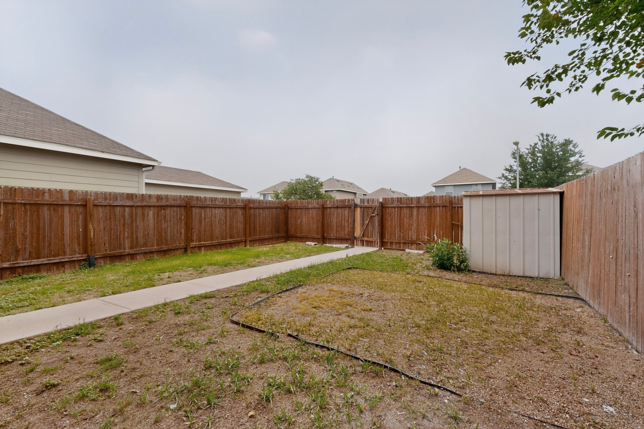 4619 Inicio Lane Austin, TX 78725 - Photo 32 of 32 a view of a backyard