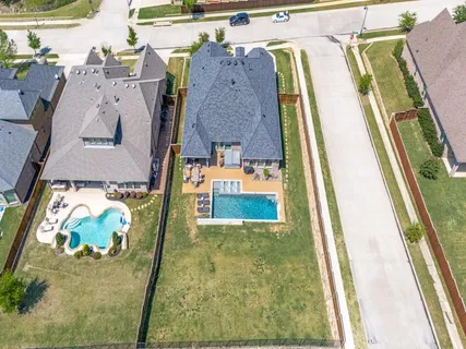 an aerial view of a swimming pool