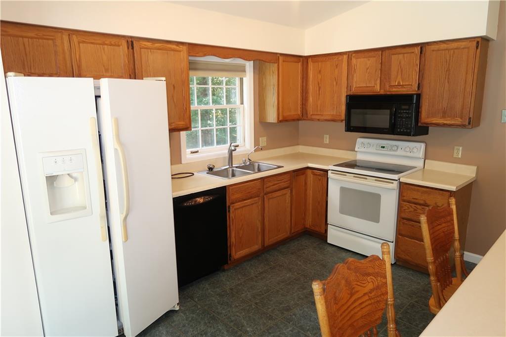 519 Eight Rod Road Augusta, ME 04330 - Photo 9 of 34 Oak kitchen cabinets
