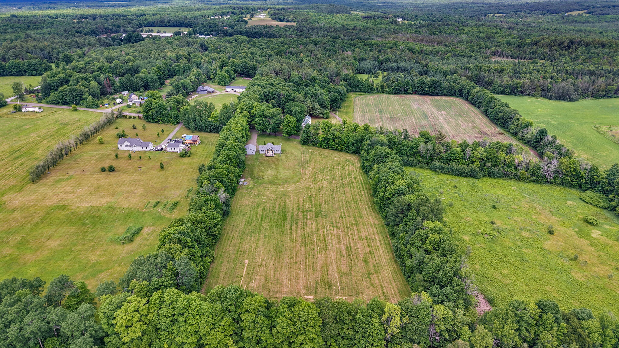 37 West Barker Road Corinna, ME 04928 - Photo 7 of 35 dji_fly_20260615_130224_0698_17815431368