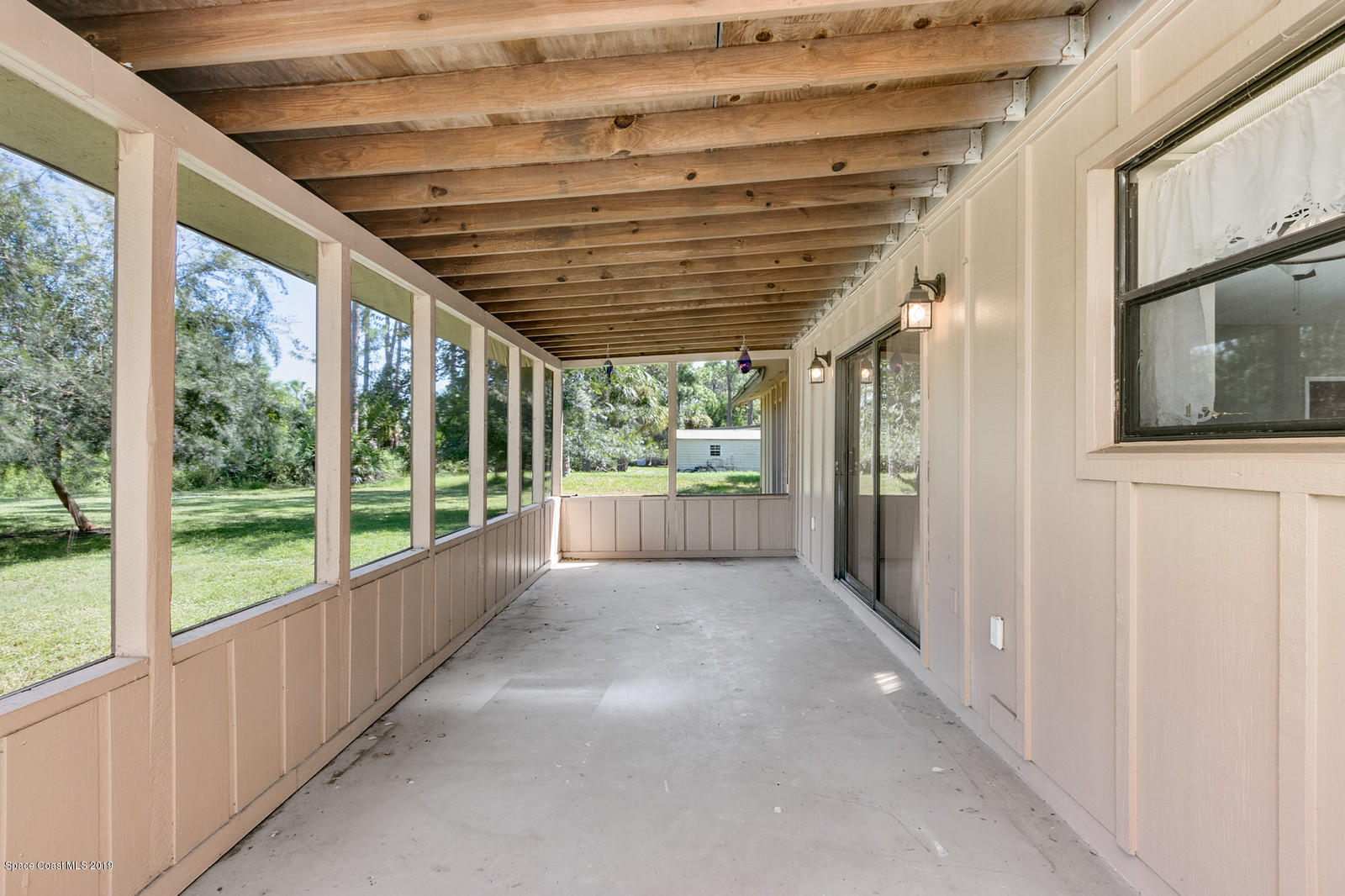 1695 Emmaus Road Northwest Palm Bay, FL 32907 - Photo 23 of 30 a view of a porch