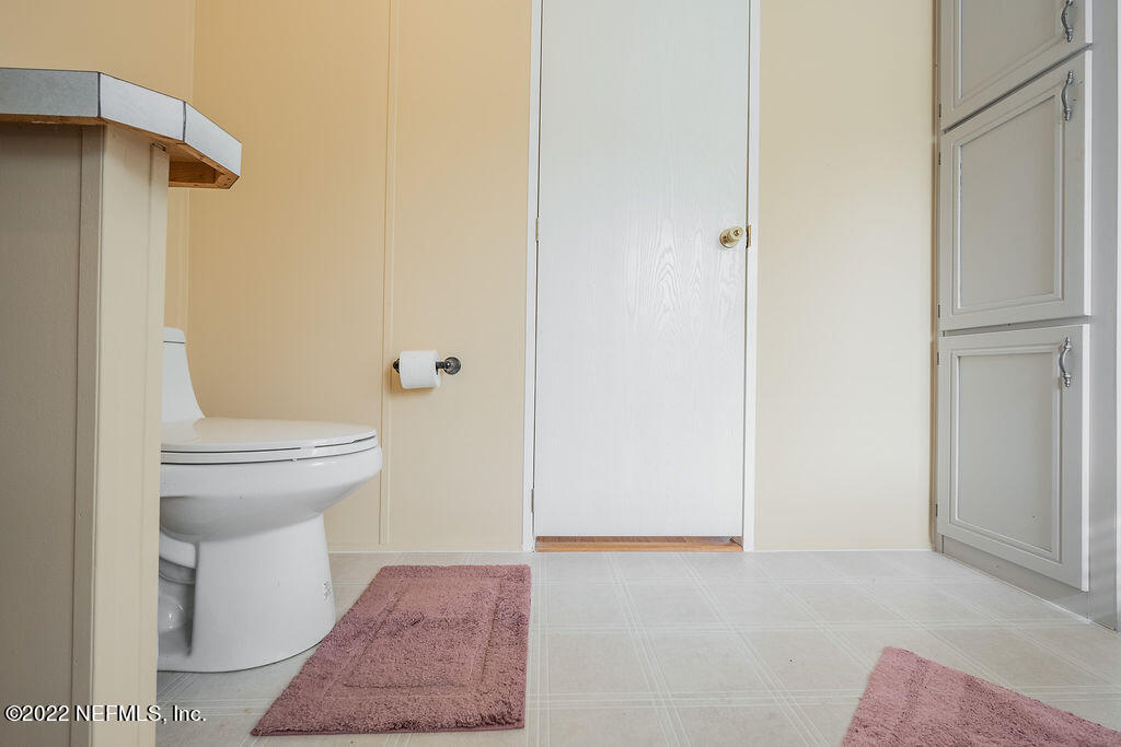 540532 Lem Turner Road Callahan, FL 32011 - Photo 24 of 62 a bathroom with a toilet and a shower