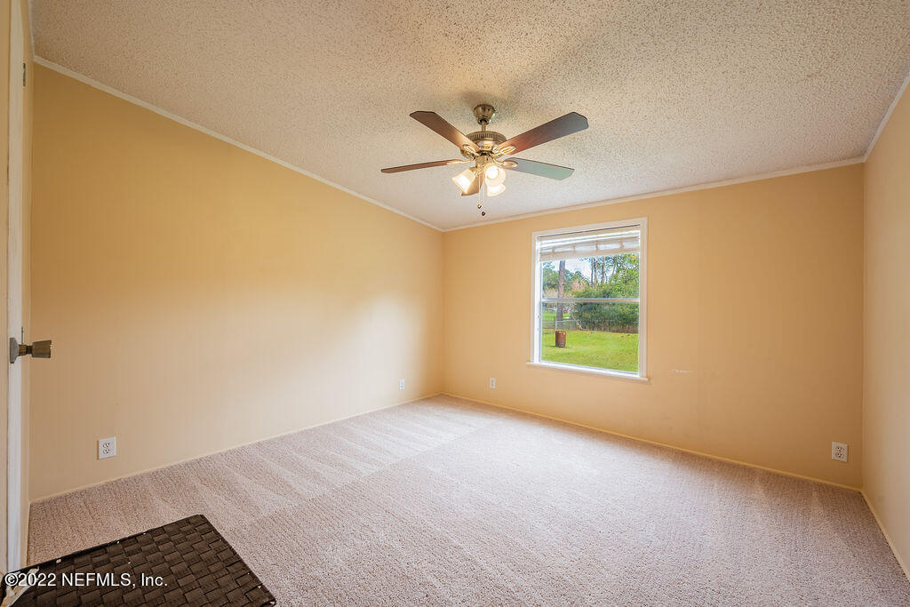 540532 Lem Turner Road Callahan, FL 32011 - Photo 40 of 62 a view of an empty room with a window