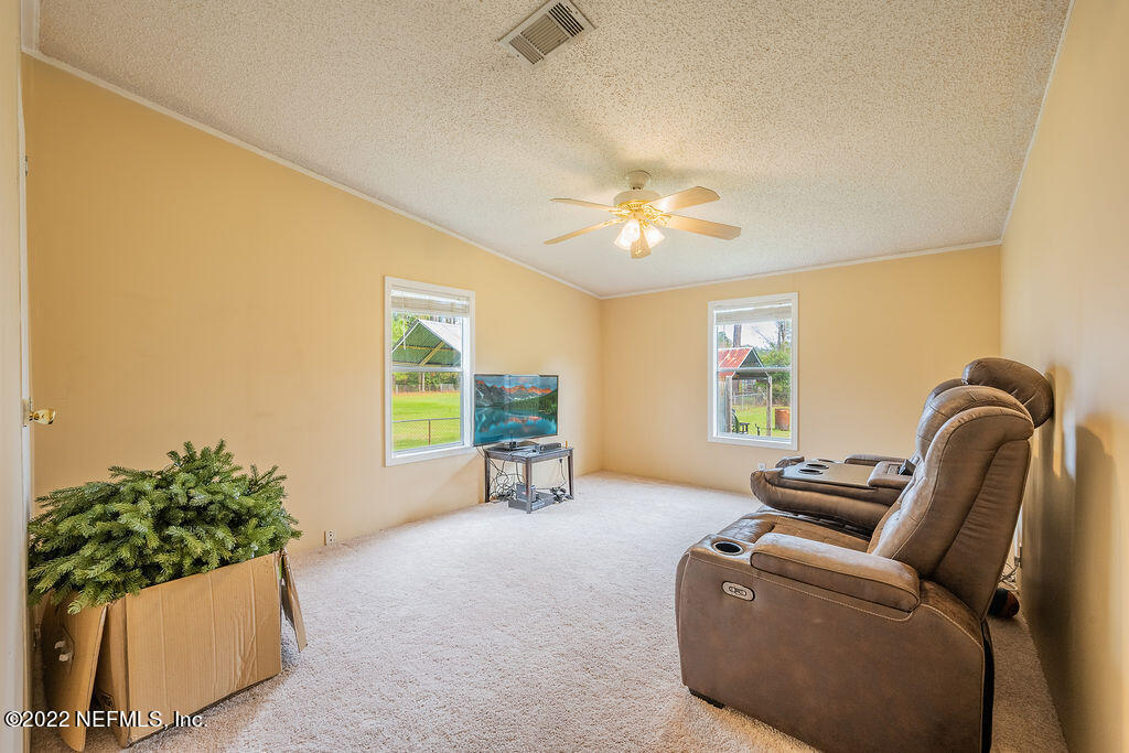 540532 Lem Turner Road Callahan, FL 32011 - Photo 42 of 62 a living room with furniture and a window