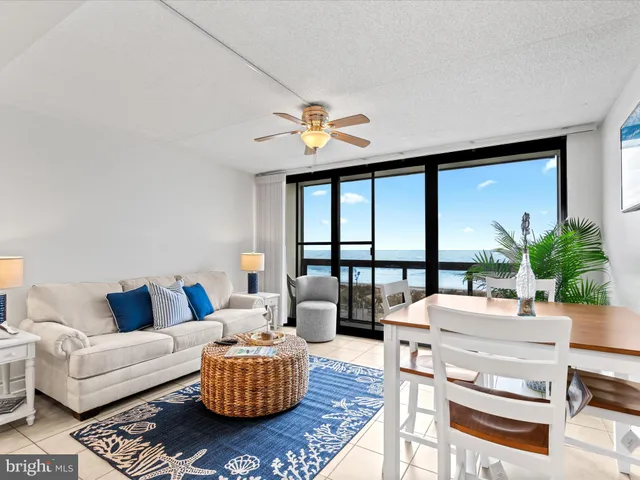 a kitchen with stainless steel appliances granite countertop a refrigerator stove top oven and sink