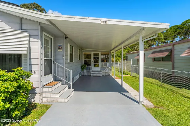 a view of swimming pool with seating space