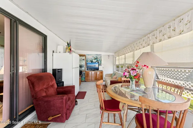 a view of swimming pool with a patio