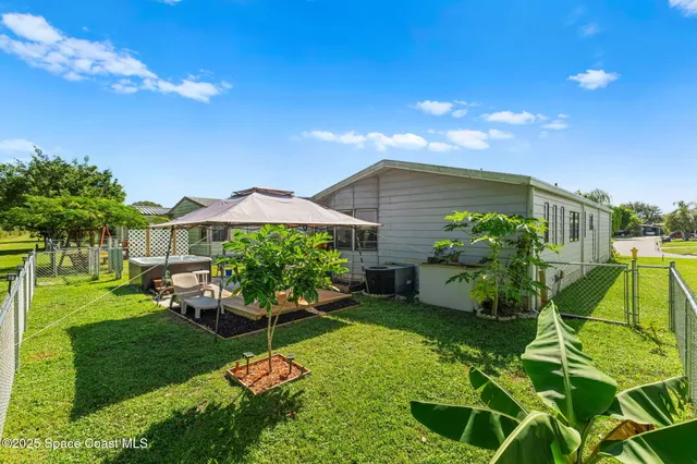 a garden view with a seating space