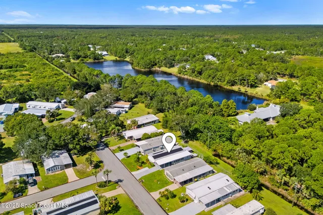 a view of swimming pool with lake view and mountain view