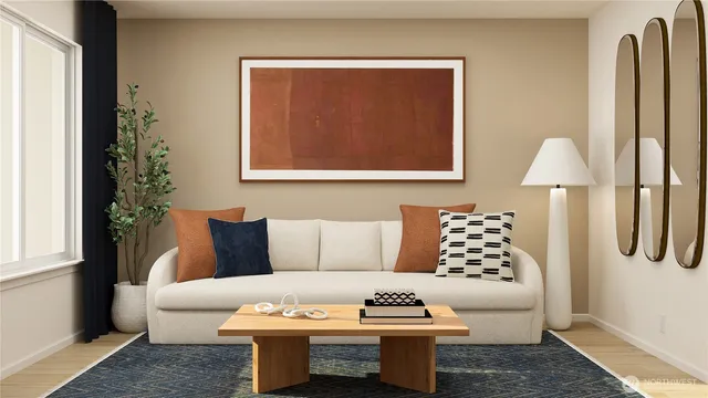 a living room with furniture a rug and a window