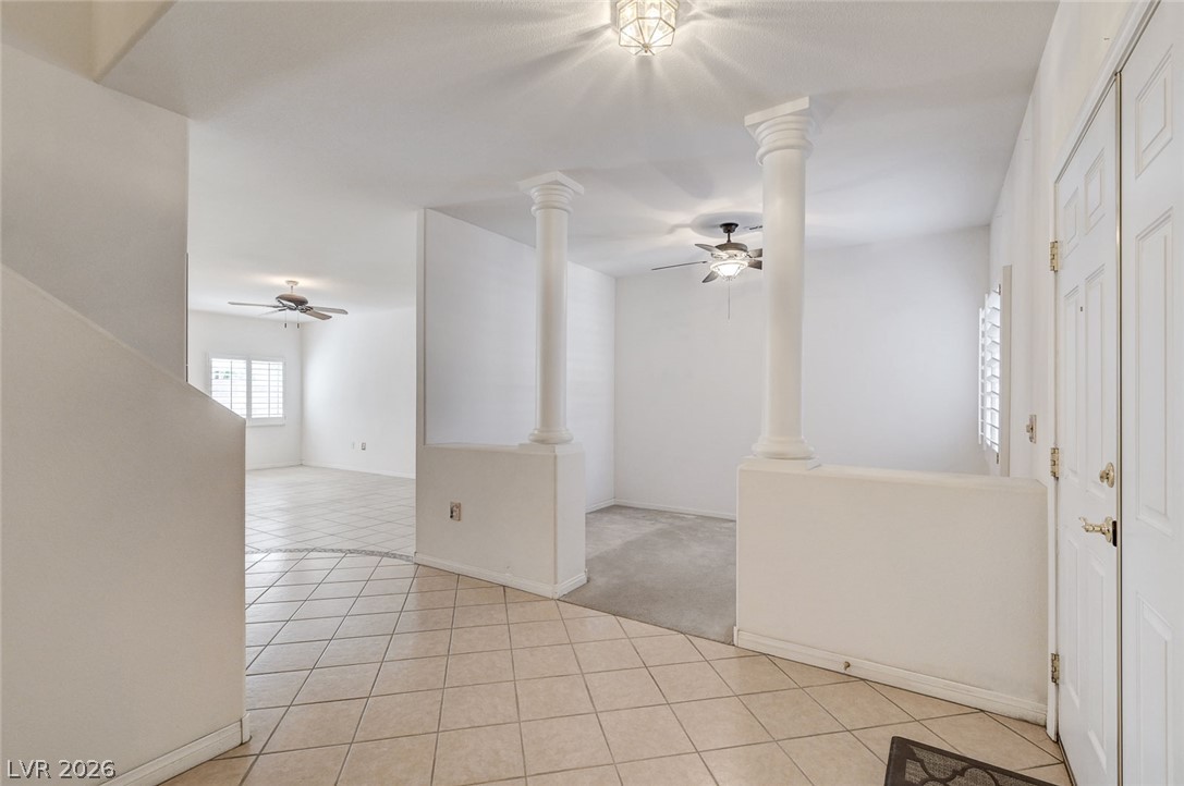 1479 Orange Jubilee Road Henderson, NV 89014 - Photo 3 of 36 A graceful entry with decorative columns introduces inviting, neutral interiors.