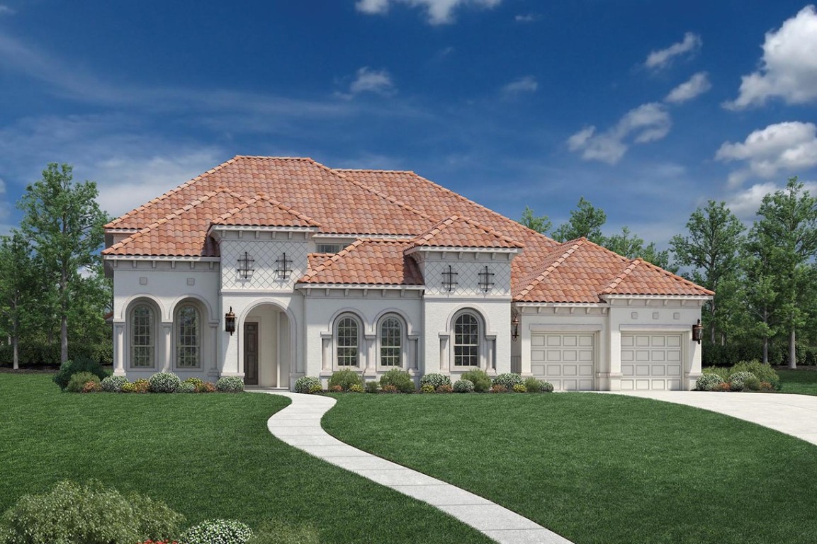 a view of a white house with a yard