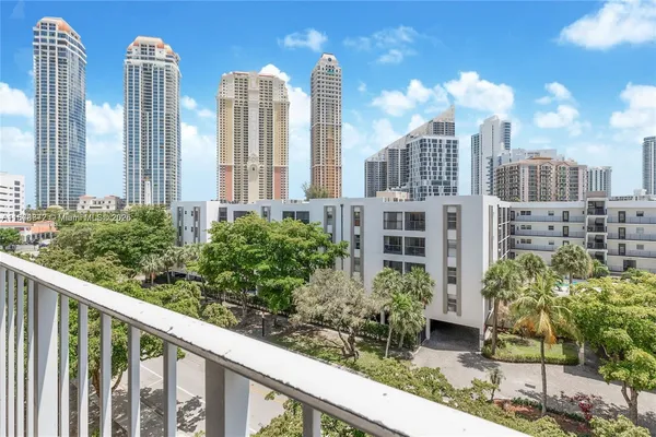 a view of a city with tall buildings
