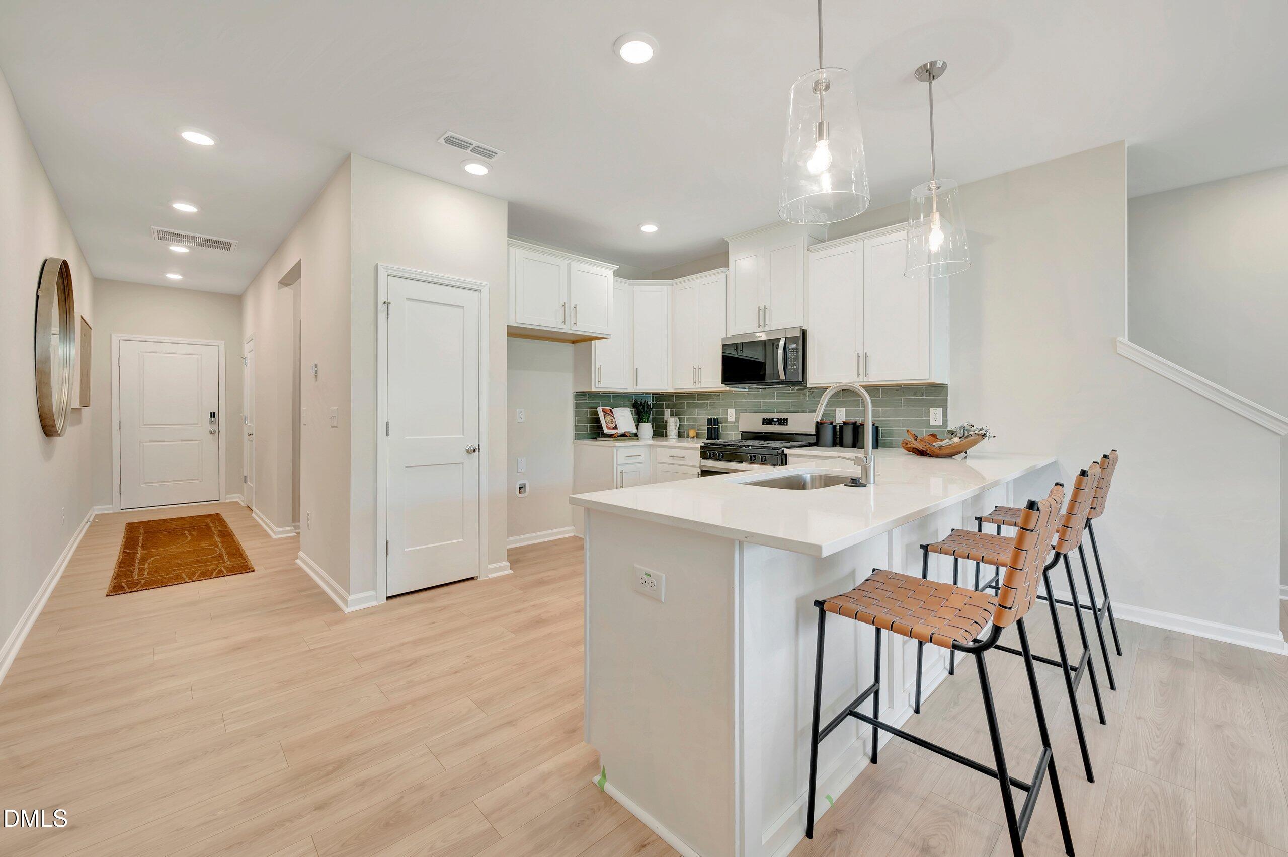 5018 Silver Brk Road Durham, NC 27703 - Photo 31 of 41 4 Pioneer Kitchen & Foyer