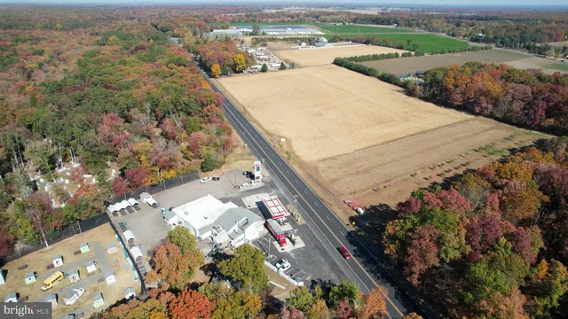 an aerial view of residential house and outdoor space