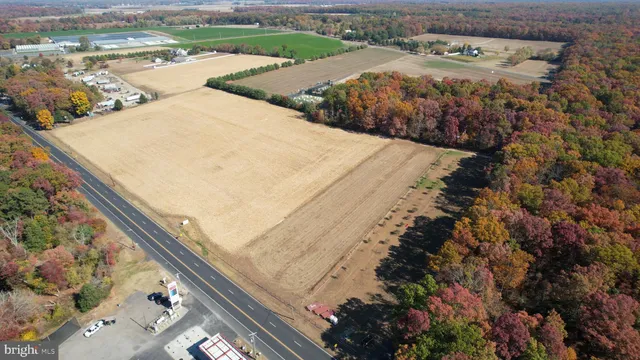 a view of a swimming pool with an outdoor space and seating area