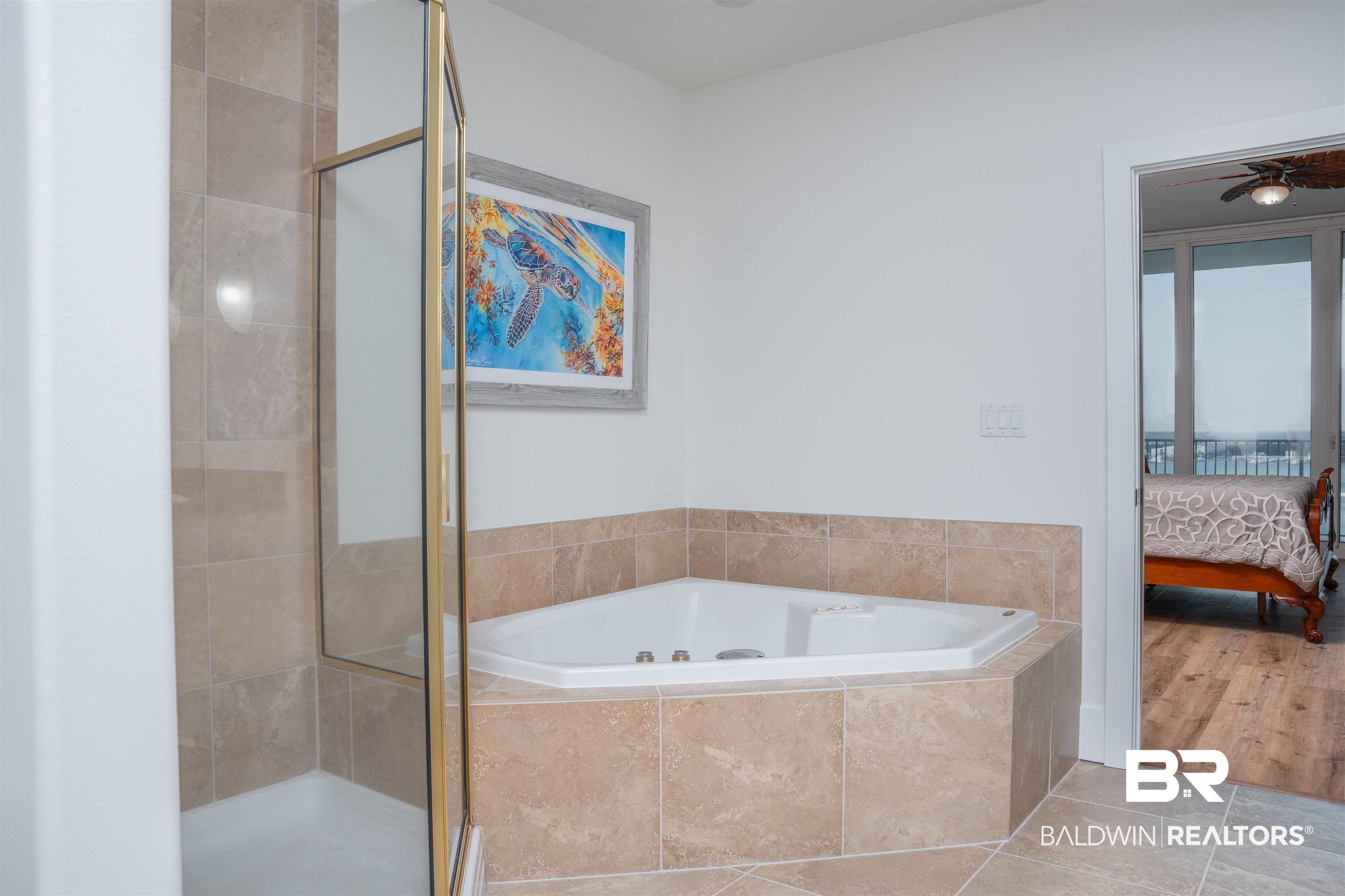 28107 Perdido Beach Boulevard, Unit DPH05 Orange Beach, AL 36561 - Photo 13 of 43 Ensuite bathroom featuring tile patterned flooring, a shower stall, a jetted tub, and a ceiling fan