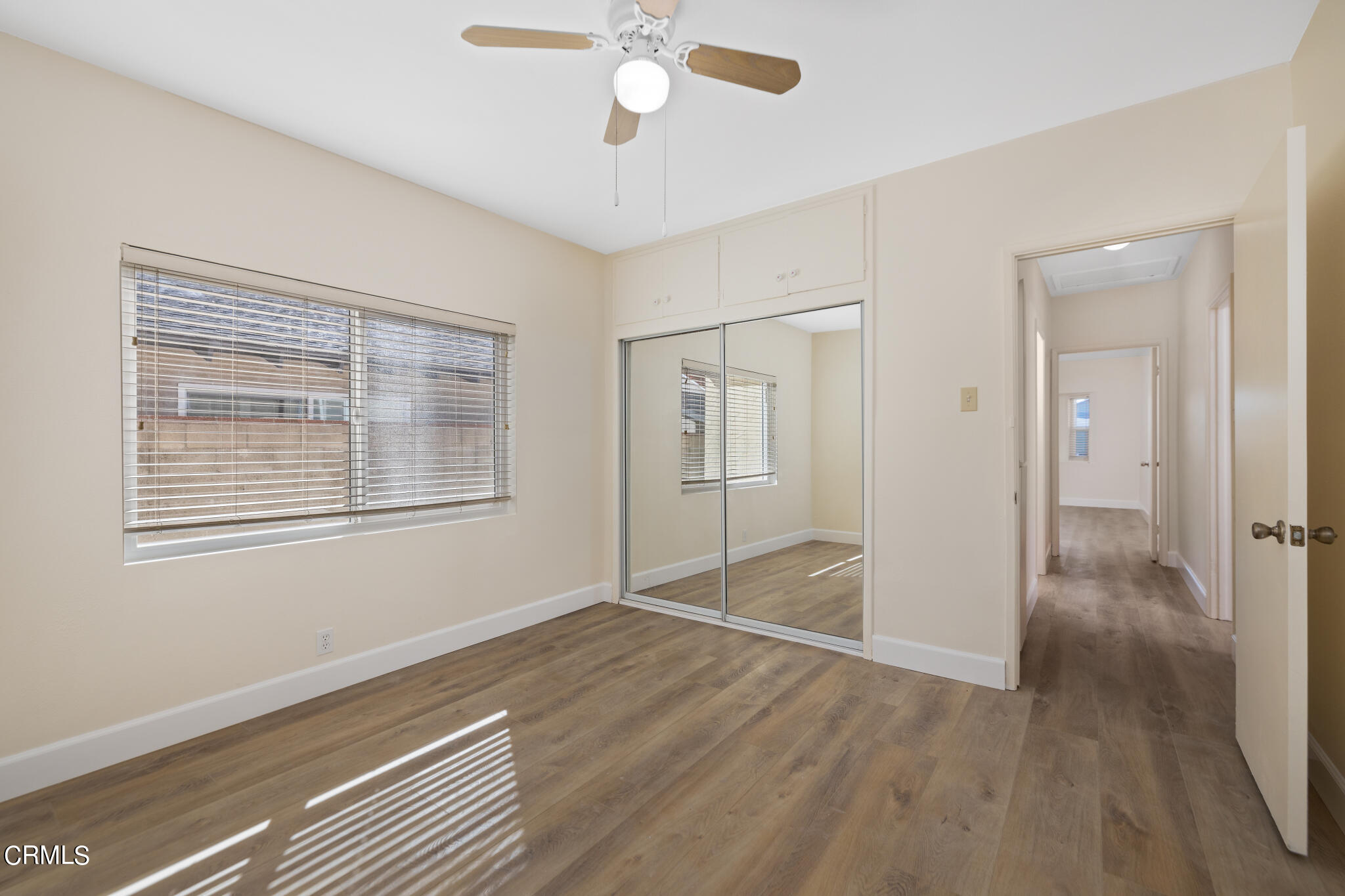 4516 Earle Avenue Rosemead, CA 91770 - Photo 13 of 23 a view of empty room with wooden floor and fan