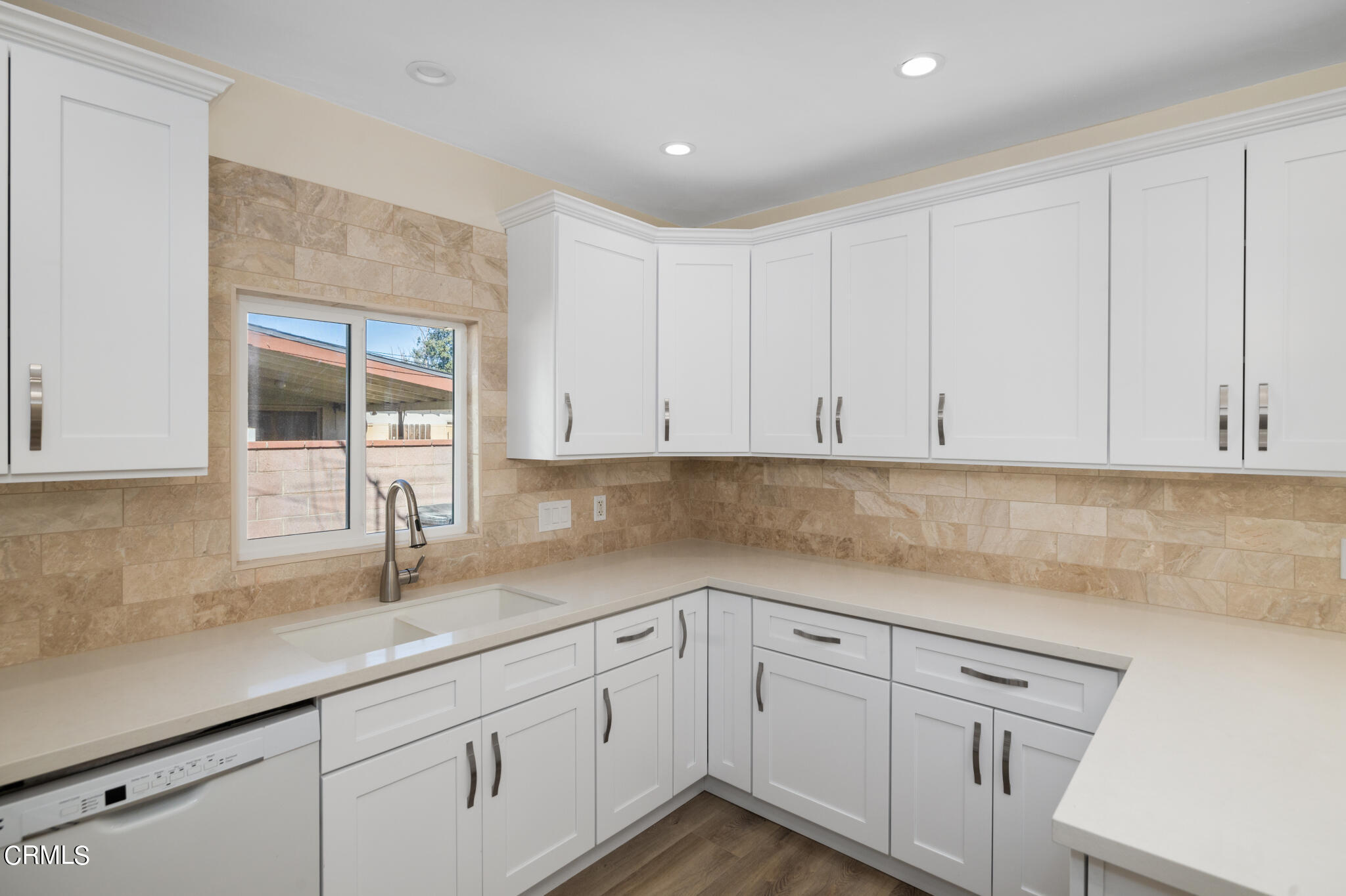 4516 Earle Avenue Rosemead, CA 91770 - Photo 8 of 23 a kitchen with granite countertop white cabinets and a sink