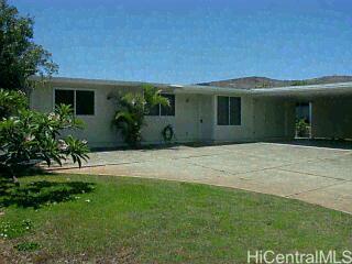 345 Lunalilo Home Road Honolulu, HI 96825 - Photo 1 of 1 a front view of a house with a yard