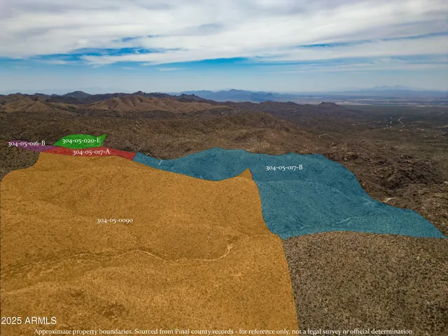 a view of a field with an ocean