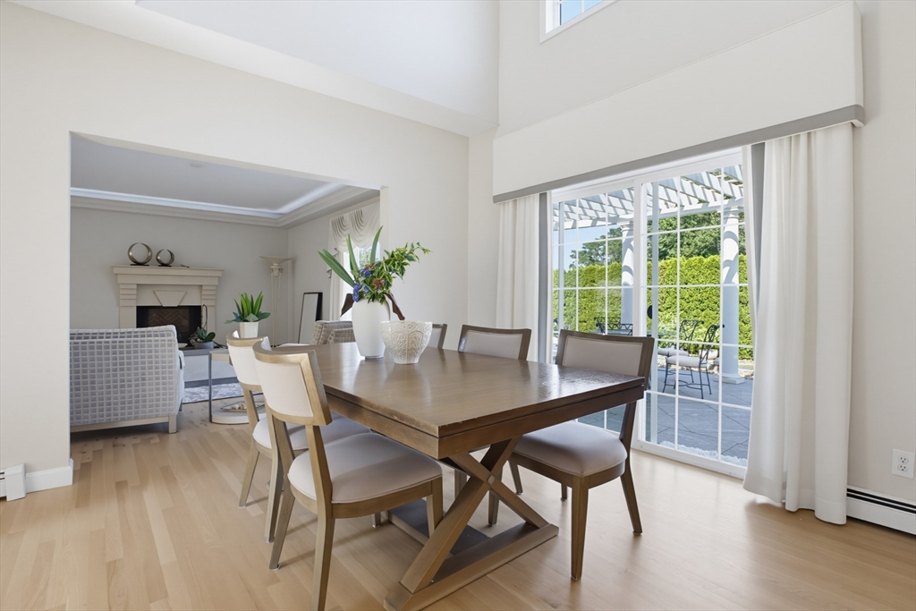 226 Olympic Road Somerset, MA 02726 - Photo 8 of 42 a view of a dining room with furniture window and wooden floor