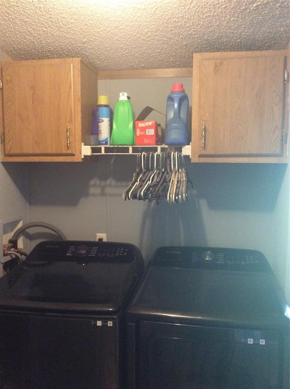 8762 Private Road 4641 Baird, TX 79504 - Photo 14 of 36 a kitchen with a sink and a stove top oven