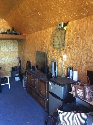 a view of a livingroom with furniture