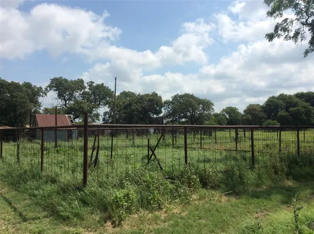 a view of a lake from a yard