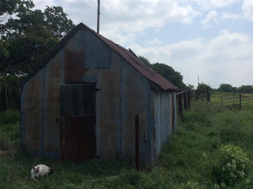8762 Private Road 4641 Baird, TX 79504 - Photo 30 of 36 a backyard of a house with lots of green space