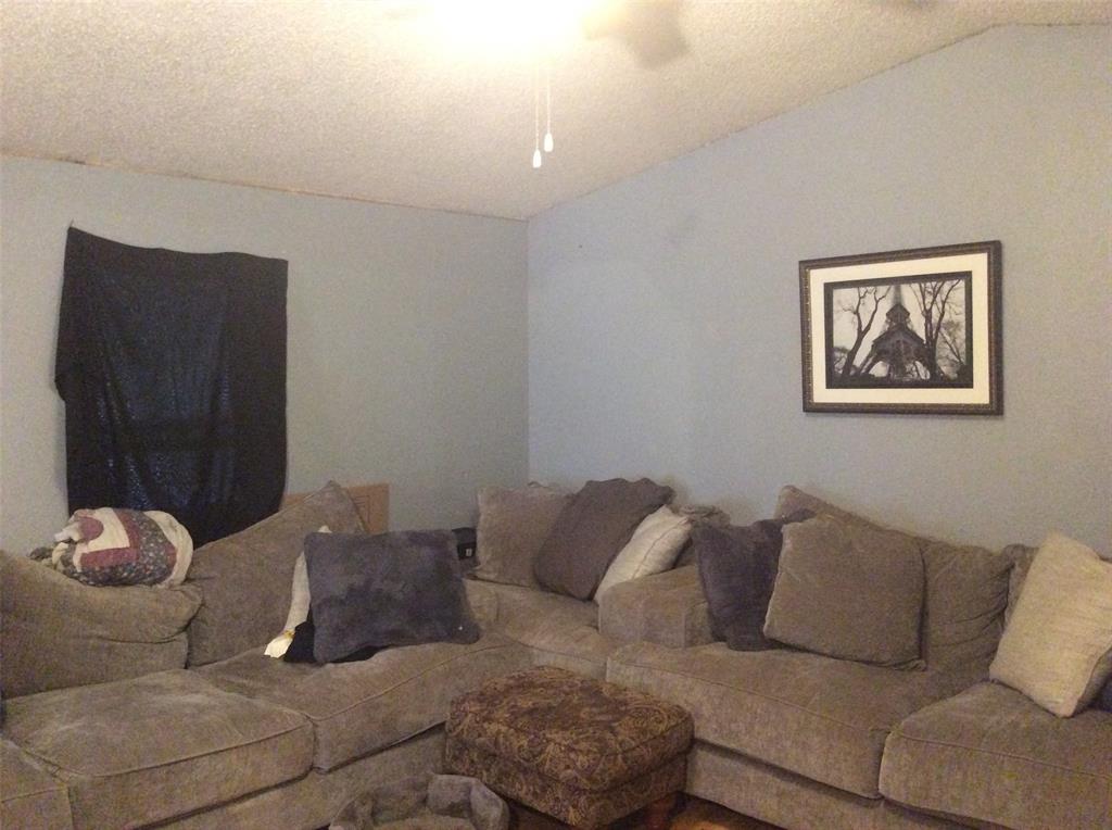 8762 Private Road 4641 Baird, TX 79504 - Photo 9 of 36 a living room with a couch