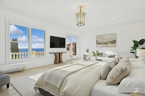 a spacious bathroom with a double vanity sink large mirror and a bathtub