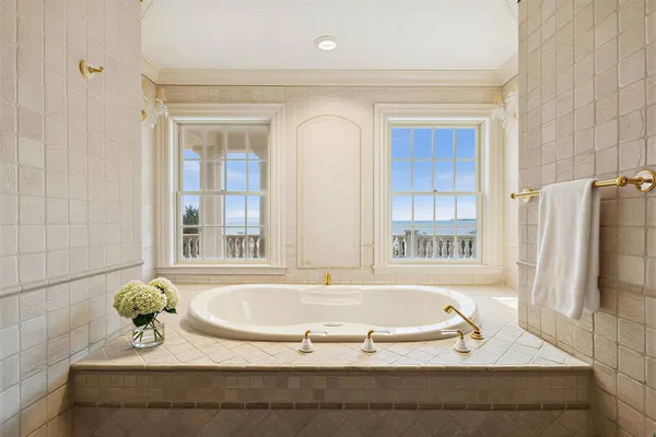 a living room with furniture and windows