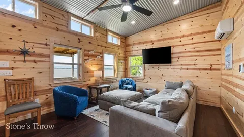 a kitchen with stainless steel appliances granite countertop a stove and a microwave