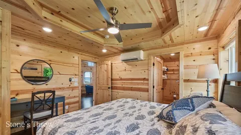 a view of a balcony with furniture