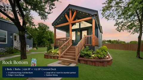 a kitchen with stainless steel appliances granite countertop a stove and a refrigerator
