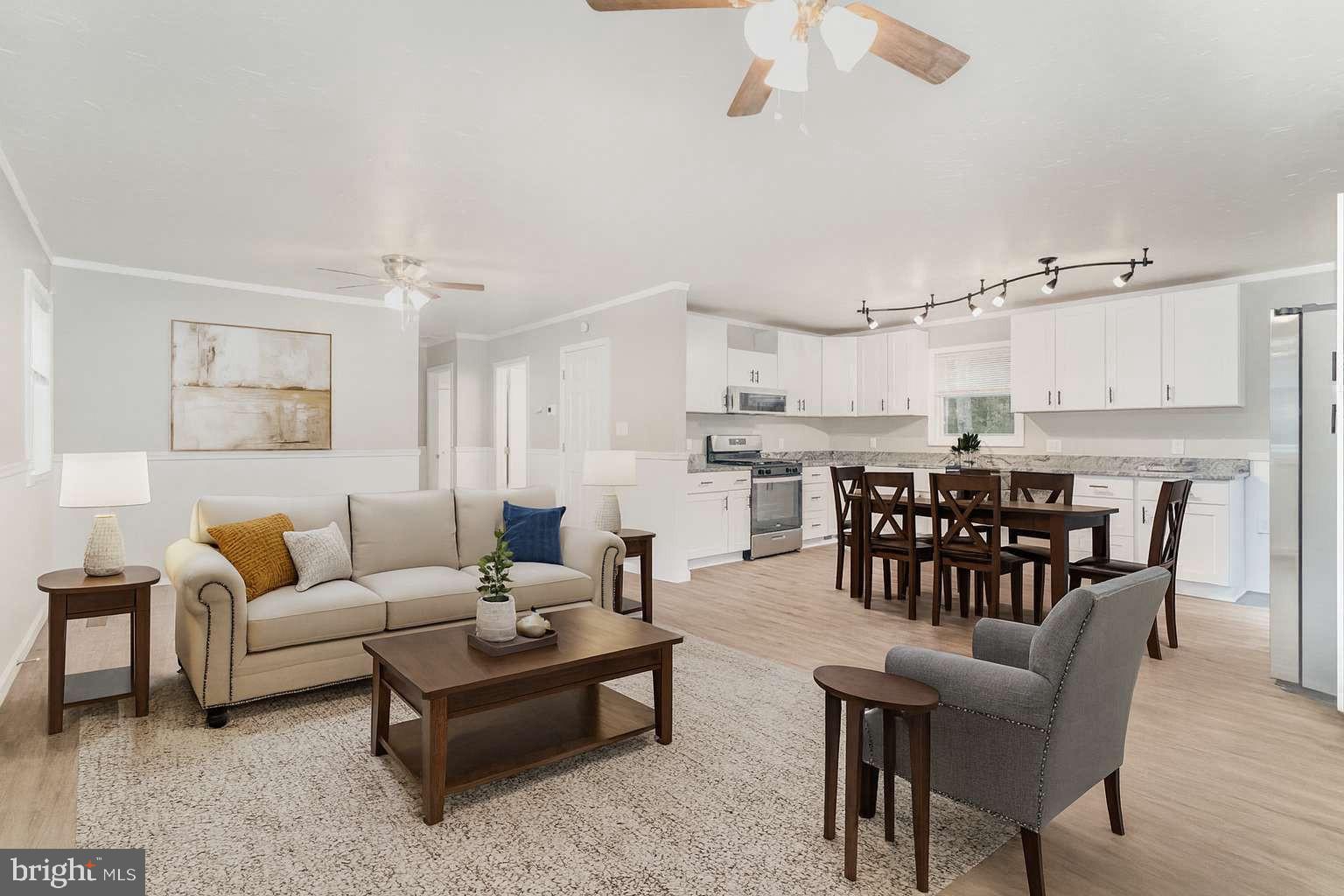 475 Company Farm Road Aspers, PA 17304 - Photo 12 of 45 a living room with furniture and kitchen view