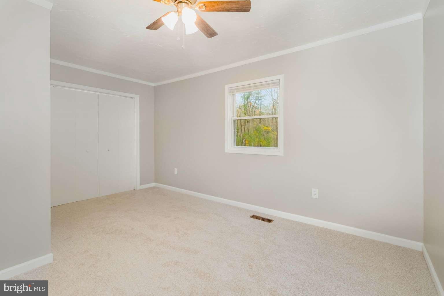 475 Company Farm Road Aspers, PA 17304 - Photo 20 of 45 an empty room with a window