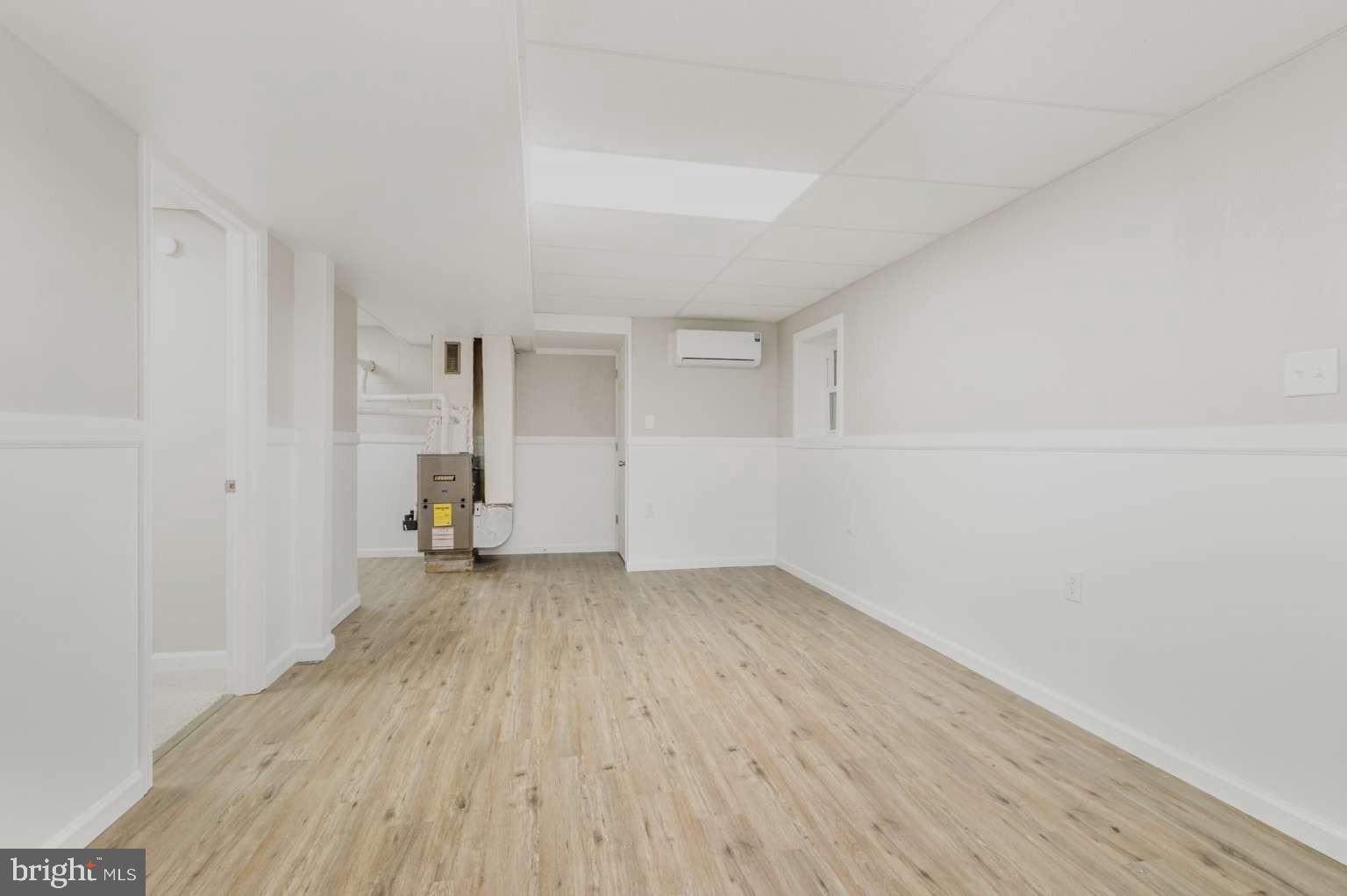 475 Company Farm Road Aspers, PA 17304 - Photo 23 of 45 a view of empty room with wooden floor