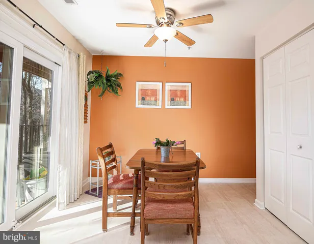a view of a livingroom with furniture and a window