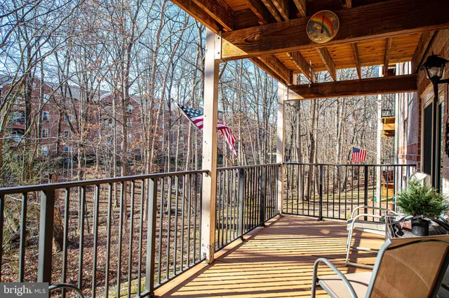 a view of balcony with a potted plant