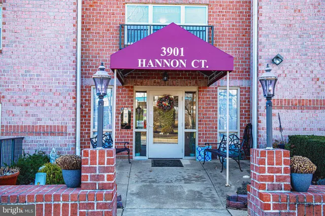 a front view of a building with glass windows