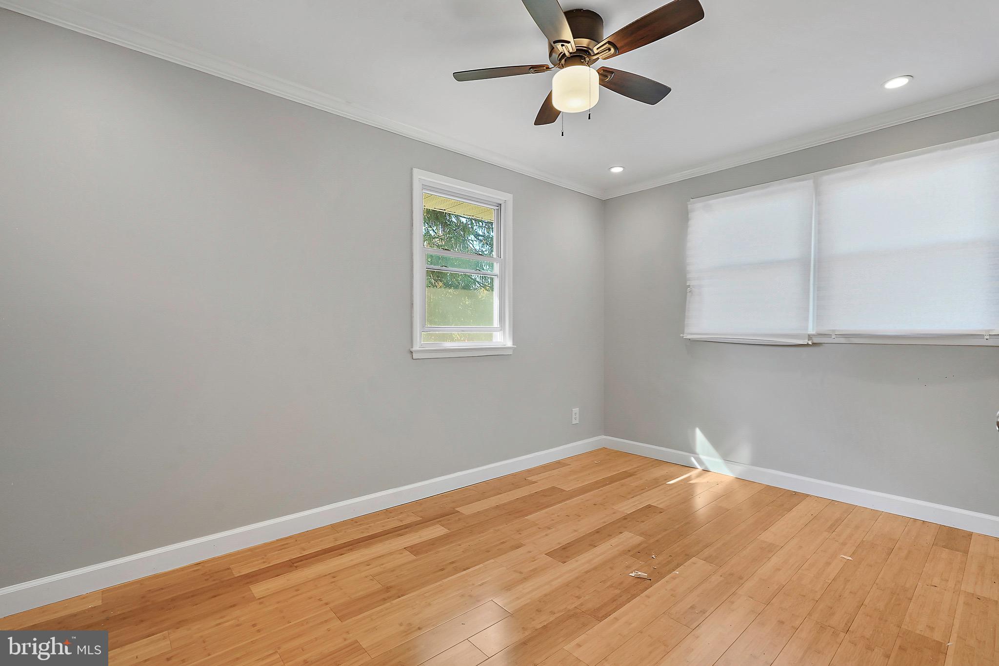 7419 Farnum Street Springfield, VA 22151 - Photo 16 of 26 wooden floor in an empty room with a window