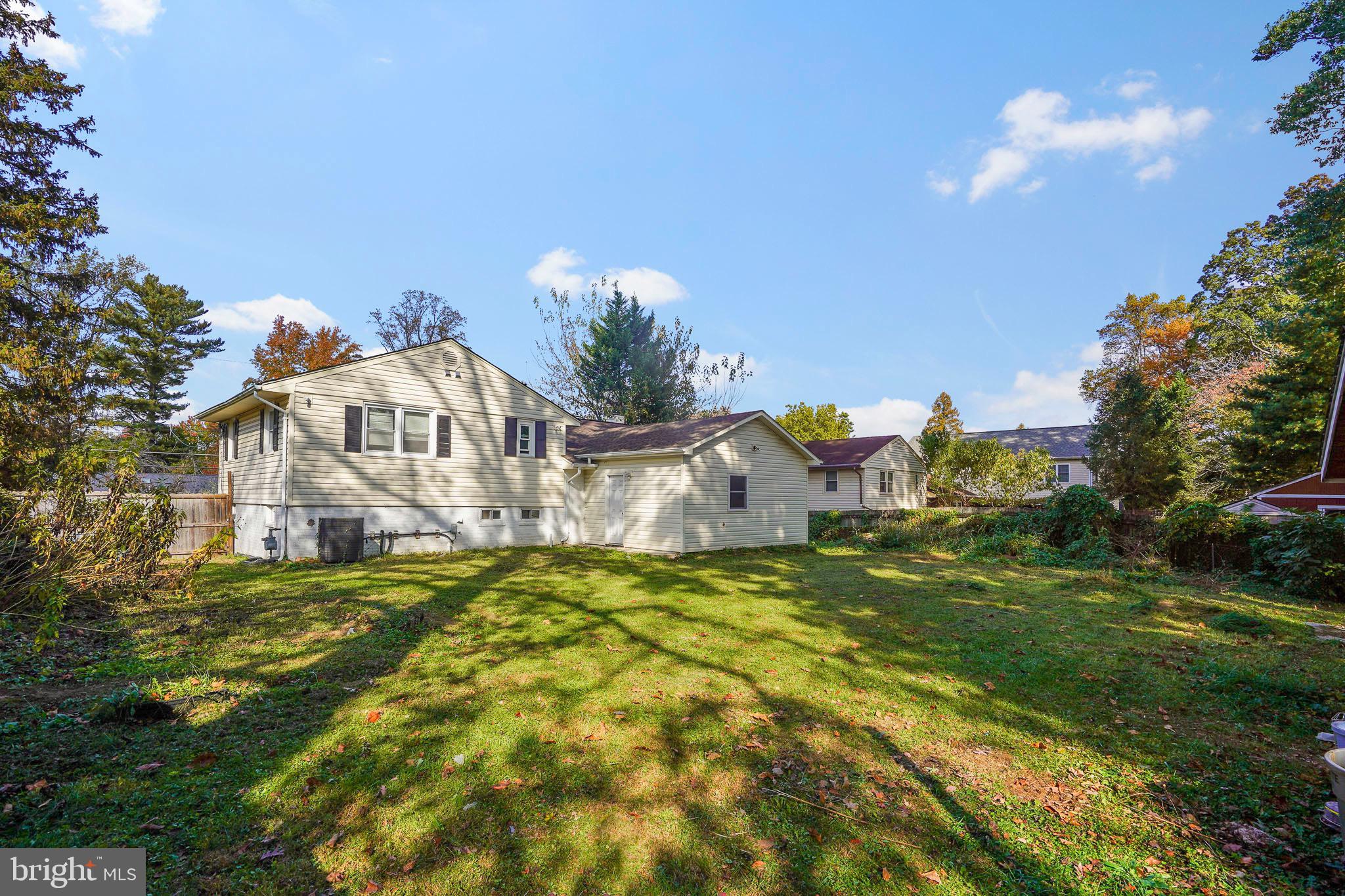 7419 Farnum Street Springfield, VA 22151 - Photo 2 of 26 a view of a house with a yard
