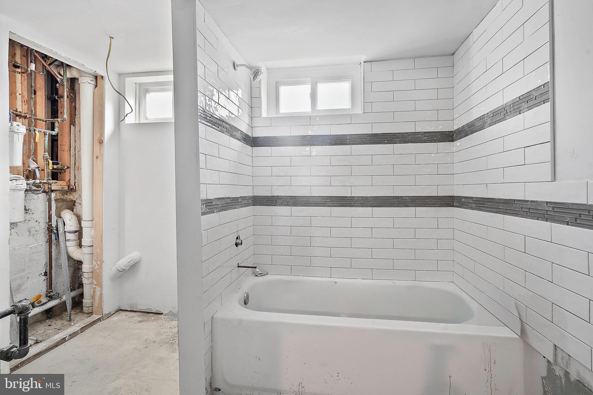 7419 Farnum Street Springfield, VA 22151 - Photo 20 of 26 a bathroom with a bathtub