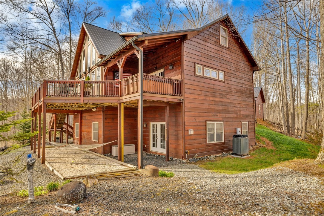 7994 3 Top Road Todd, NC 28684 - Photo 39 of 50 a view of a house with a yard