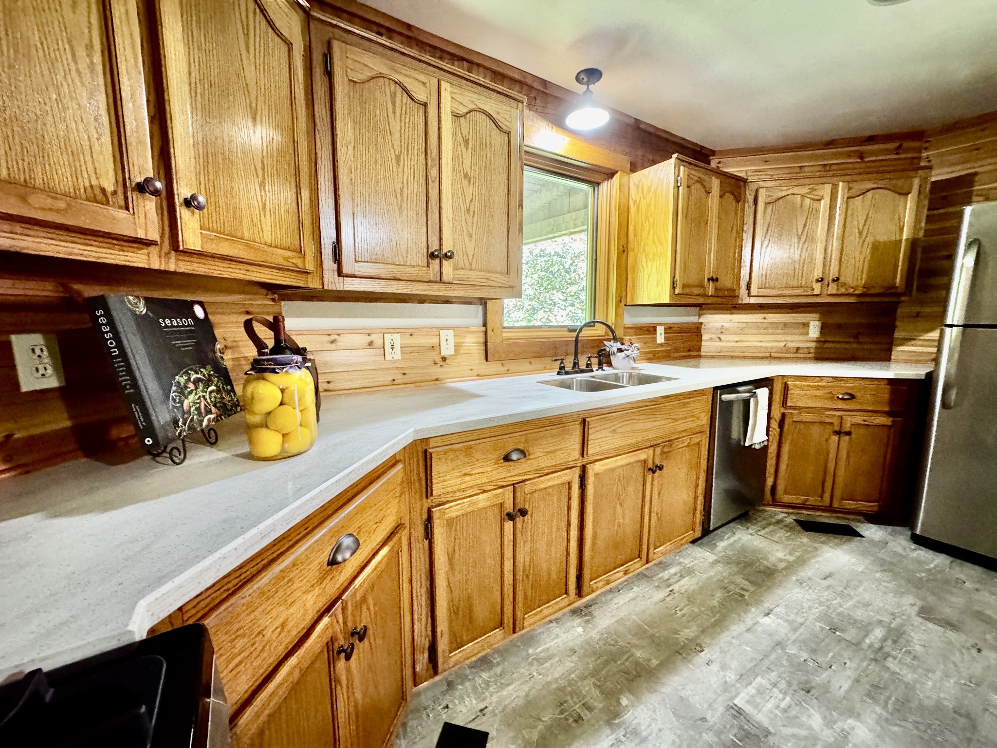 1342 Aetna Church Road Centerville, TN 37033 - Photo 10 of 59 a kitchen with sink cabinets and window