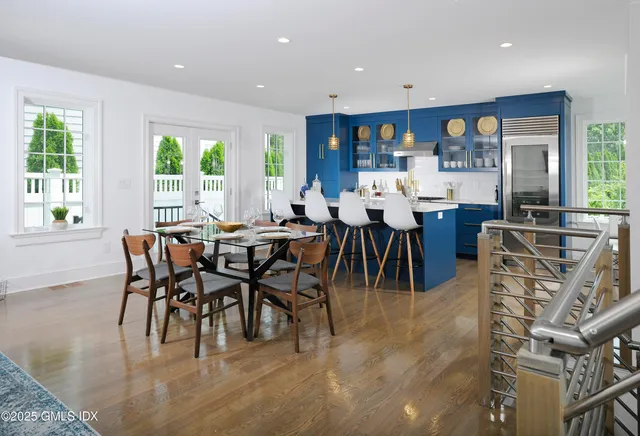 a view of a dining room with furniture window and outside view