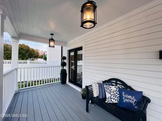 a view of a deck with wooden floor and outdoor space