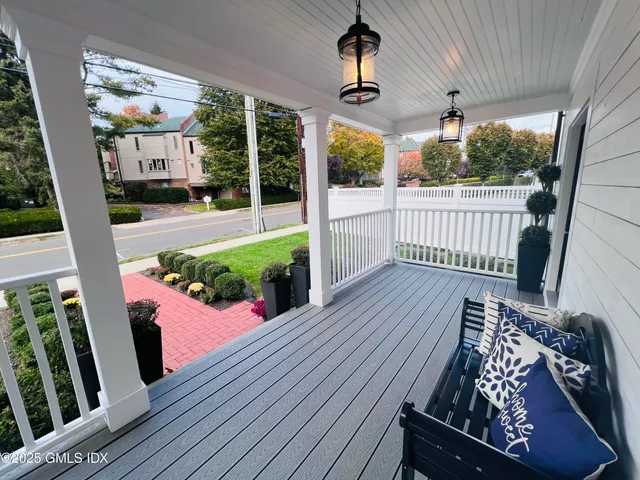 a view of a porch with furniture